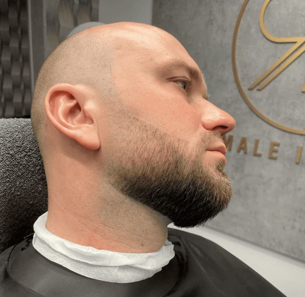 Beard grooming with bald fade haircut
